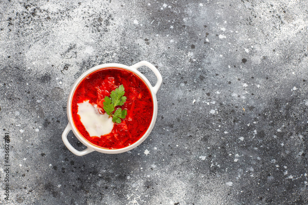 Traditional Ukrainian Russian borscht or red beetroot soup in the bowl. Traditional Ukrainian Russian borscht or red beetroot soup in the bowl.