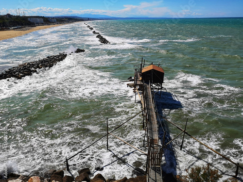 Overflow of the Adriatic sea of Termoli, Campobasso, Molise, Italy under a blue sky