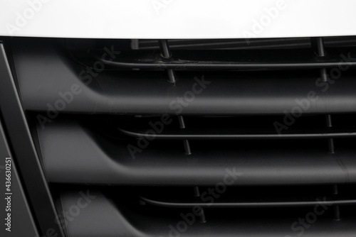 Black plastic protective car radiator grill.