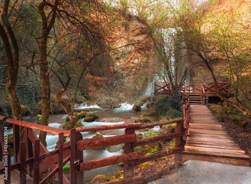 Wooden pathway leading to Veliki Buk waterfall in Lisine, Serbia