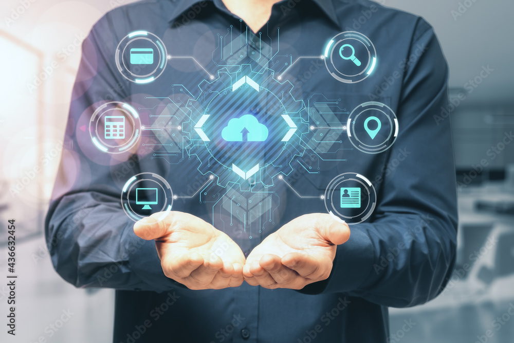 Cloud service and big data concept with digital screen with cloud and computing symbols on man palms background. Cloud service and big data concept with digital screen with cloud and computing symbols on man palms background.
