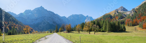 idyllic karwendel valley  tirolean alps  and walkway in autumnal landscape austria