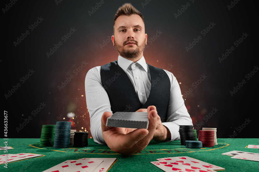 Ταπετσαρία Male dealer at the casino at the table