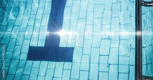 Composition of swimming pool with lanes  glowing light and copy space