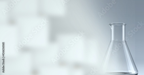 Composition of empty chemistry conical flask, with blurred white copy space