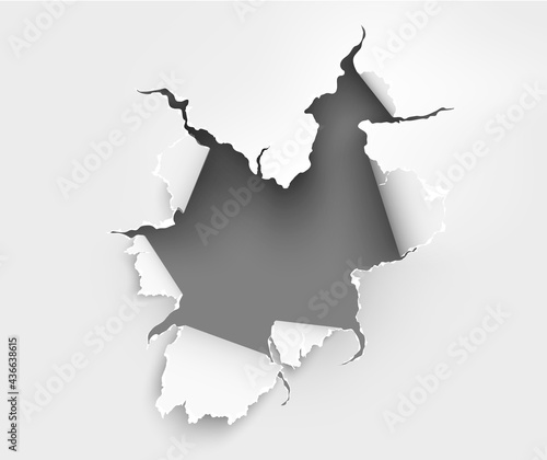ragged Hole torn in ripped paper on background