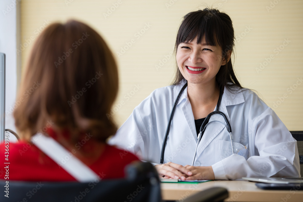 Asian doctor toothy smile to patient after explaining illness was positive. She likes representative pharmaceutical. Her happy face and advisor good for health care business. Asian doctor toothy smile to patient after explaining illness was positive. She likes representative pharmaceutical. Her happy face and advisor good for health care business.
