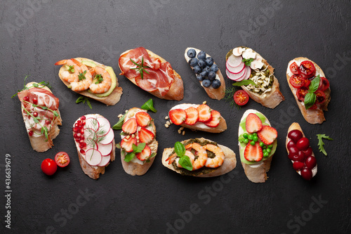 Appetizers plate with traditional spanish tapas set. Italian antipasti brushetta snacks