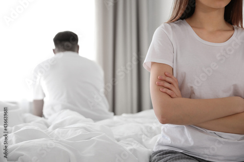 Photos Unhappy young couple with relationship problems at home, closeup