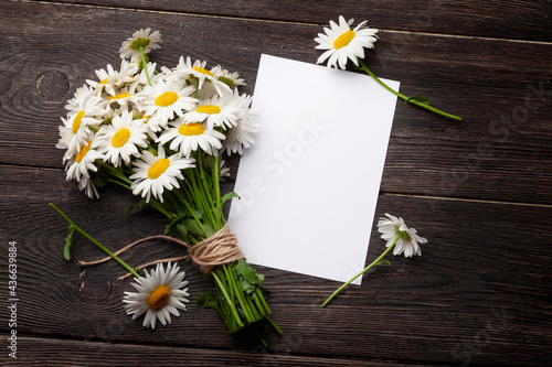 Garden camomile flowers bouquet and greering card photo