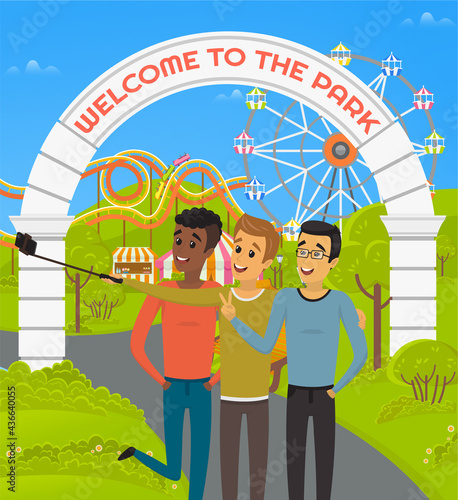 Group of male friends taking selfie and laughing. Selfie in amusement park. Men with phone on monopod are posing for self photo during joyride. Guys are photographed on backgroung of attractions