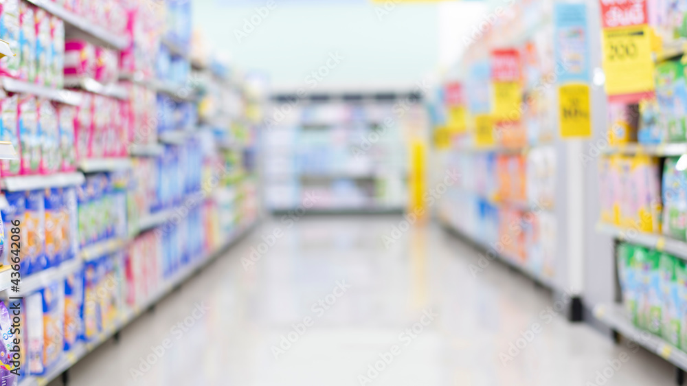 supermarket aisle blurred for background.