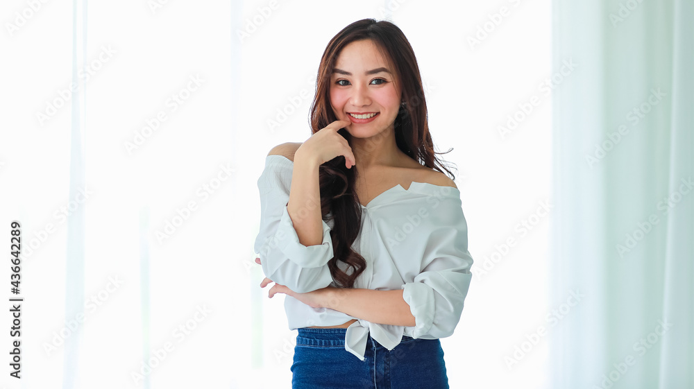 Portrait of young and cute Asian girl pose to camera with self confident and friendly happy face Portrait of young and cute Asian girl pose to camera with self confident and friendly happy face