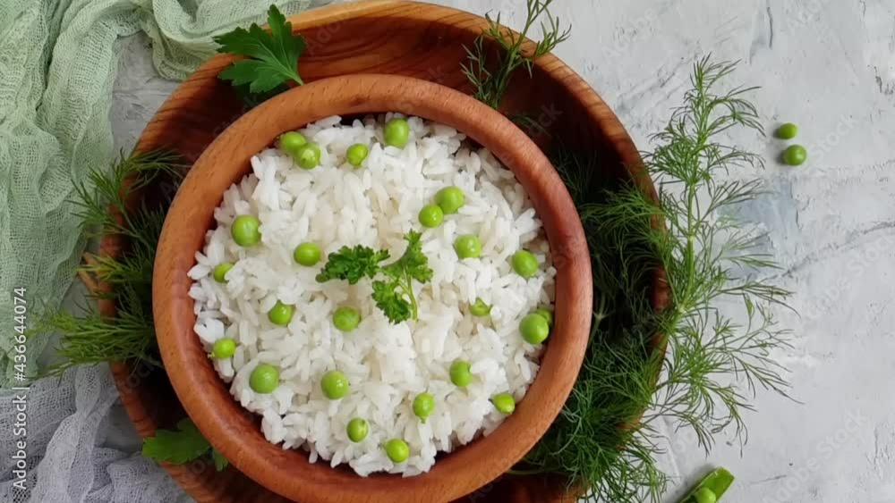rice with green peas, slow motion rice with green peas, slow motion