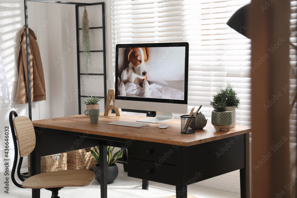 Stylish home office interior with comfortable workplace Stylish home office interior with comfortable workplace