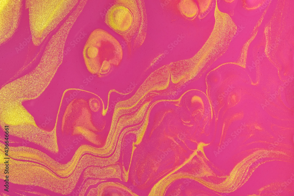 Abstract fluid art background bright purple and golden colors. Liquid marble. Acrylic painting with magenta gradient.