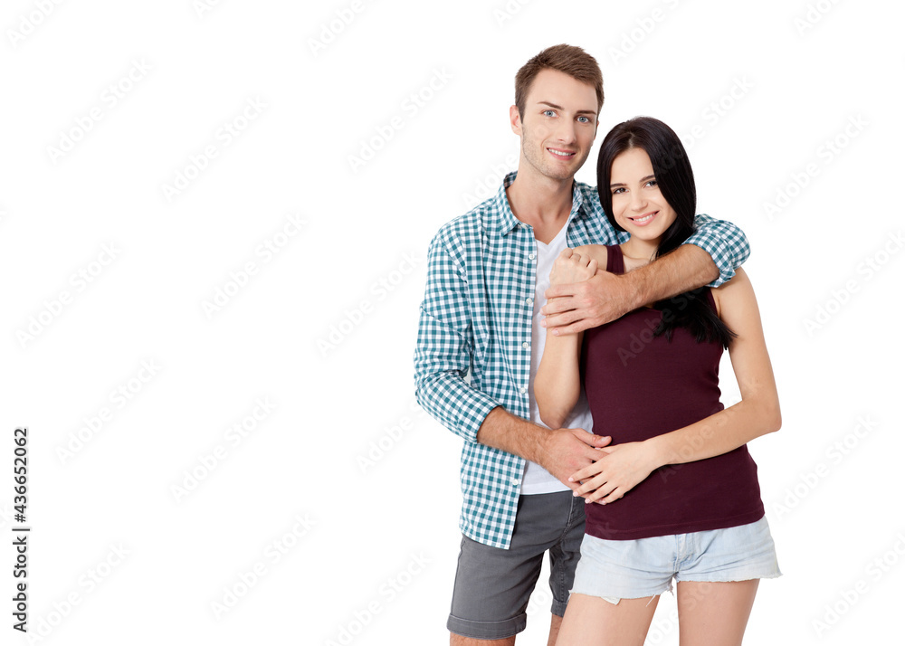 Happy couple embracing and looking camera on white background Happy couple embracing and looking camera on white background