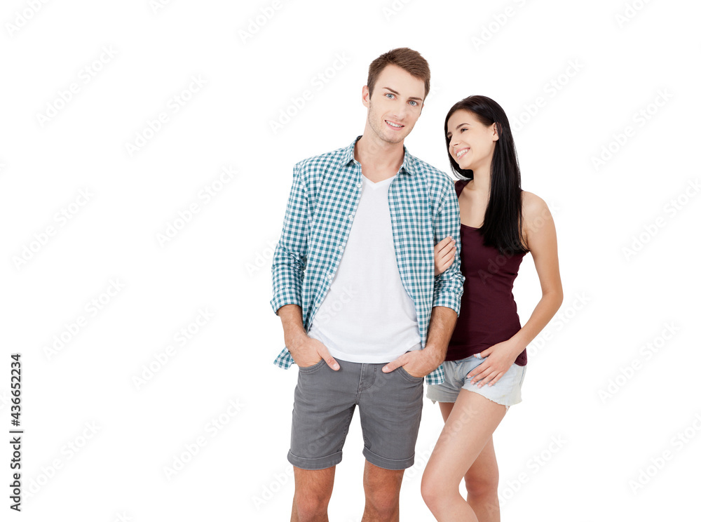 Happy couple embracing and looking camera on white background Happy couple embracing and looking camera on white background