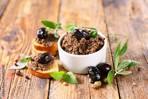 black olive- tapenade with bread toast