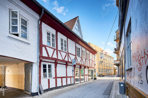a traditional danish building on a narrow street