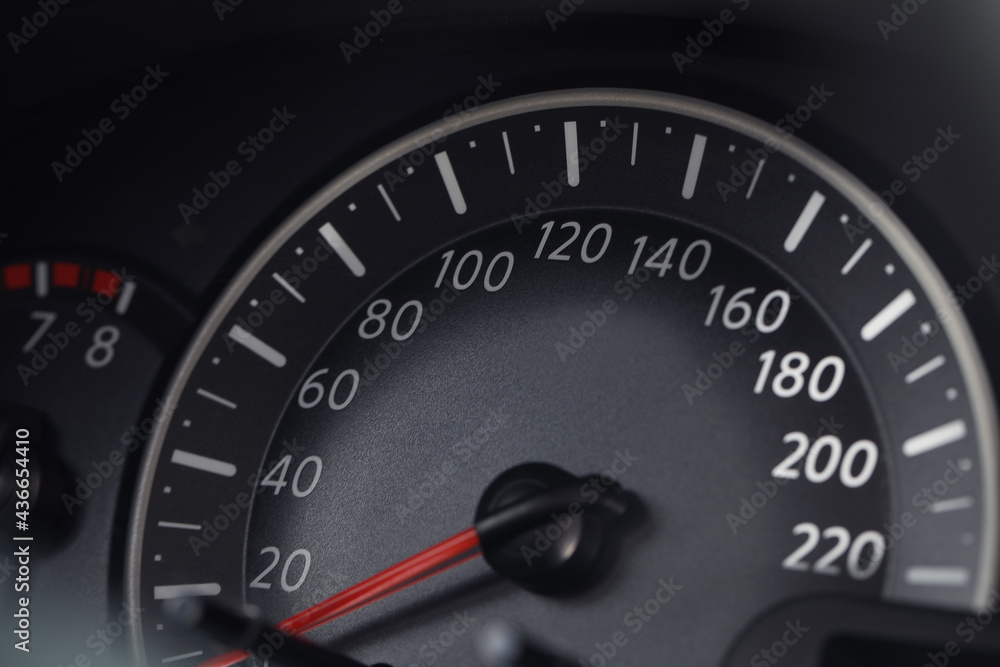 Speedometer on modern car dashboard, closeup view Speedometer on modern car dashboard, closeup view