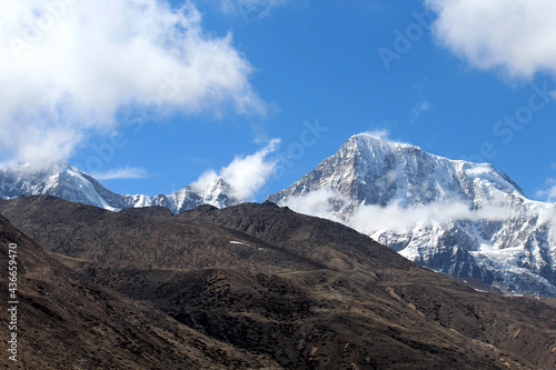 A magnificent view of giant mountain covered with fog and mist looks mesmerizing near India-China border situated at 16,500 ft altitude. All these barren lands are covered with mountains here.