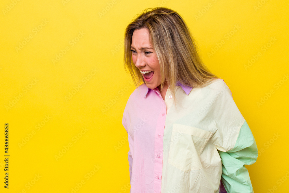Young australian woman isolated shouting very angry, rage concept, frustrated. Young australian woman isolated shouting very angry, rage concept, frustrated.