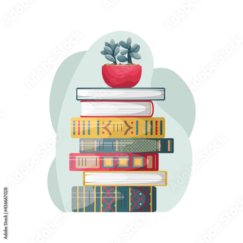 A stack of retro-style books with a flower pot on top.