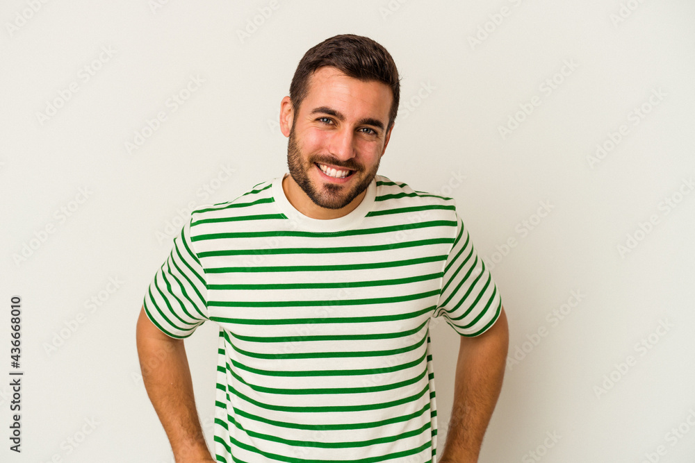 Young caucasian man isolated on white background happy, smiling and cheerful. Young caucasian man isolated on white background happy, smiling and cheerful.