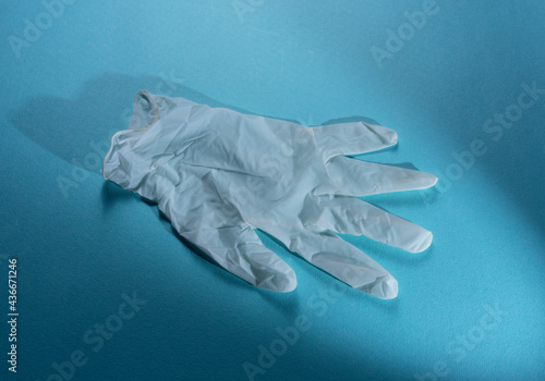 medical gloves on blue background