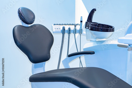 New dental equipment. Dentist chair. Chair for patient in dentist office. Equipment for dental treatment. Empty dentist chair. Equipment and furniture for dental business. Patient treatment