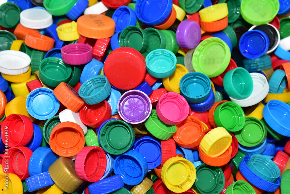 Plastic bottle caps for recycling. Cap material of plastic recyclable materials for recycling