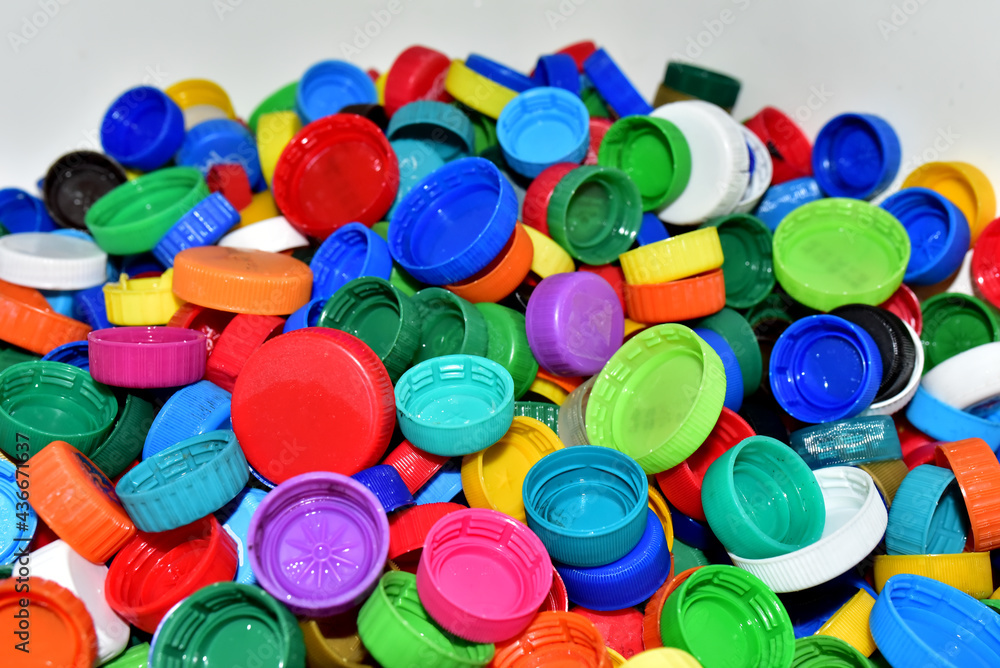Plastic bottle caps for recycling. Cap material of plastic recyclable materials for recycling