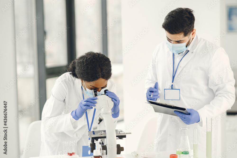 Researchers creating vaccine for covid-19 in a lab Researchers creating vaccine for covid-19 in a lab