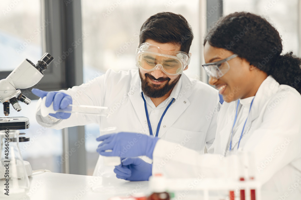 Researchers creating vaccine for covid-19 in a lab Researchers creating vaccine for covid-19 in a lab