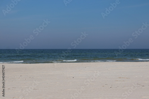 Fototapeta Naklejka Na Ścianę i Meble -  Warm sea sand on the Baltic Sea beach, Dziwnów, Poland