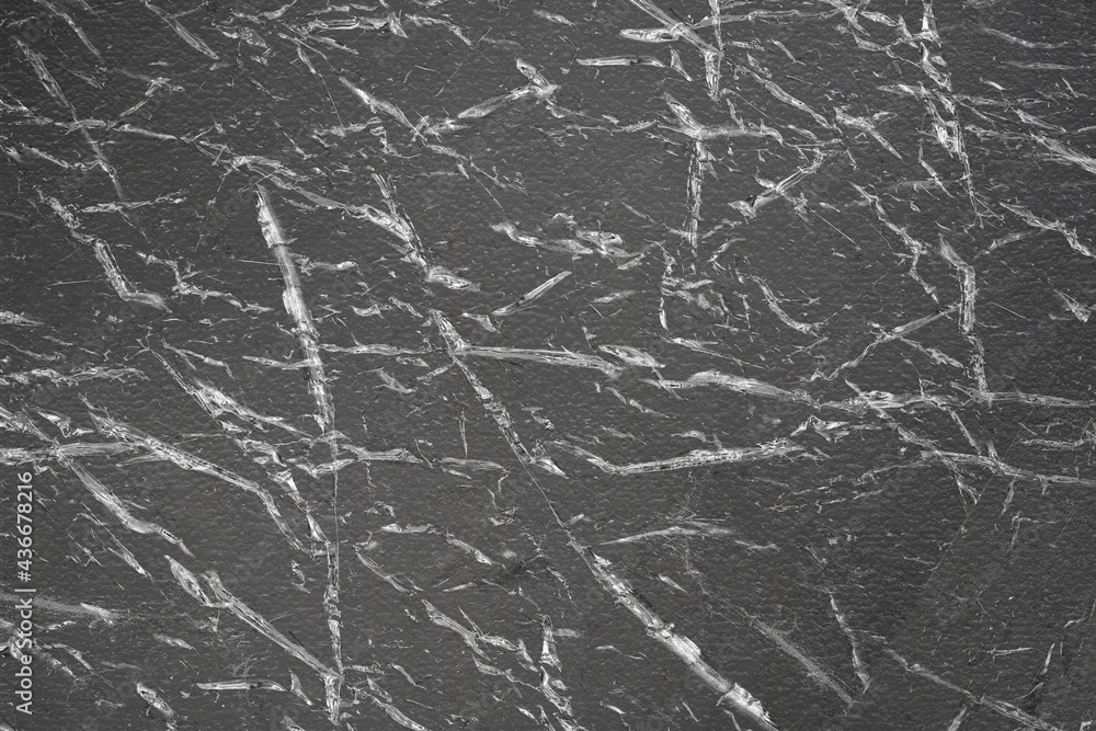 Black plastic broken paper texture. Plastic background. Black plastic broken paper texture. Plastic background.