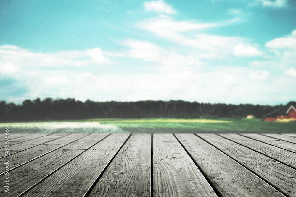 Wooden table for product and blurred landscape nature with beautiful sky background. Wooden table for product and blurred landscape nature with beautiful sky background.