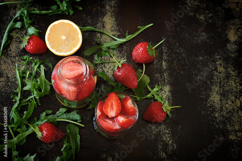 Fototapeta Naklejka Na Ścianę i Meble -  Healthy detox drink with strawberries and arugula. Summer tonic cocktail.