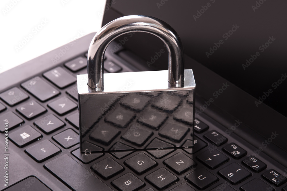 Cyber crime. Internet cyber security concept with a padlock on laptop computer. Ransomware, Malware, Encrypt and Hacking. Data security concept Cyber crime. Internet cyber security concept with a padlock on laptop computer. Ransomware, Malware, Encrypt and Hacking. Data security concept
