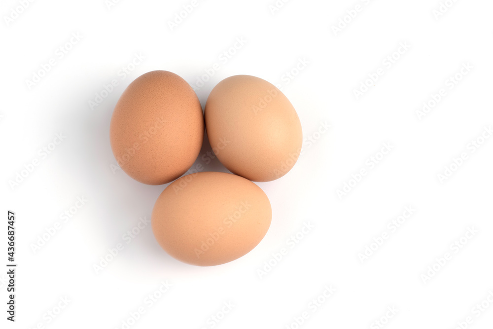 Three egg on the left of frame white background Three egg on the left of frame white background