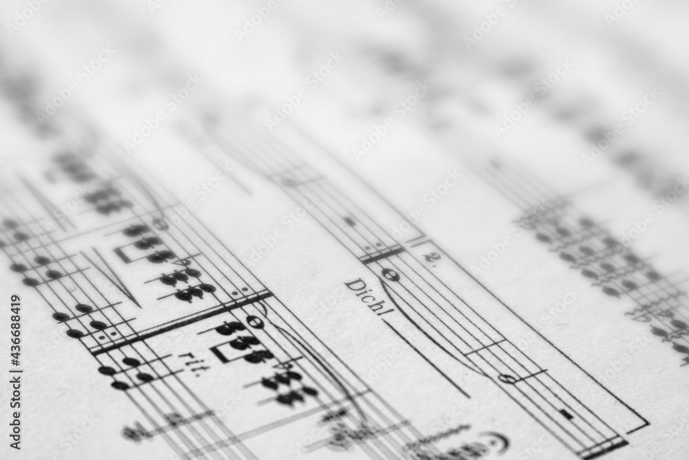 Close up of musical notes. Blurred and sharp areas. Dreamy effect. Black and white. Close up of musical notes. Blurred and sharp areas. Dreamy effect. Black and white.