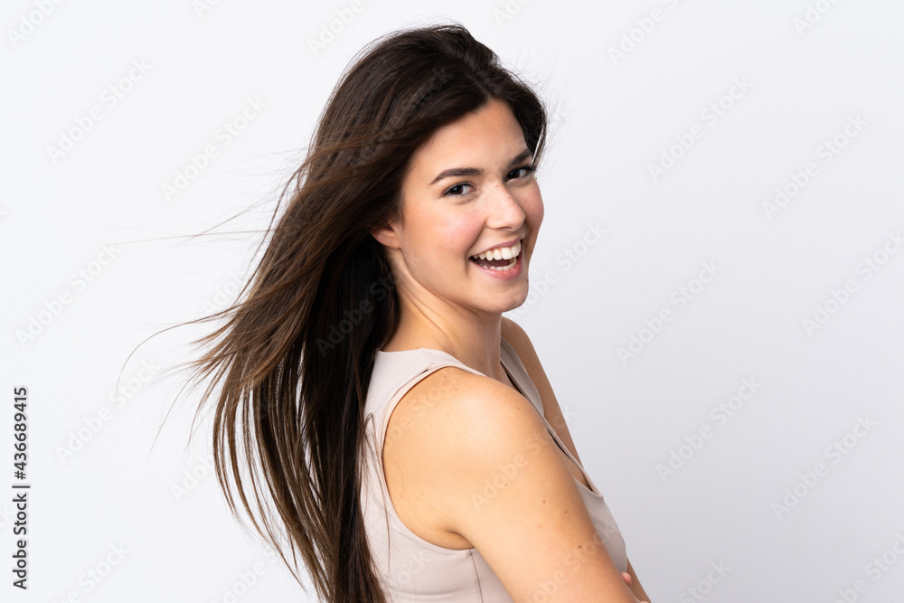 Teenager Brazilian girl over isolated background Teenager Brazilian girl over isolated background