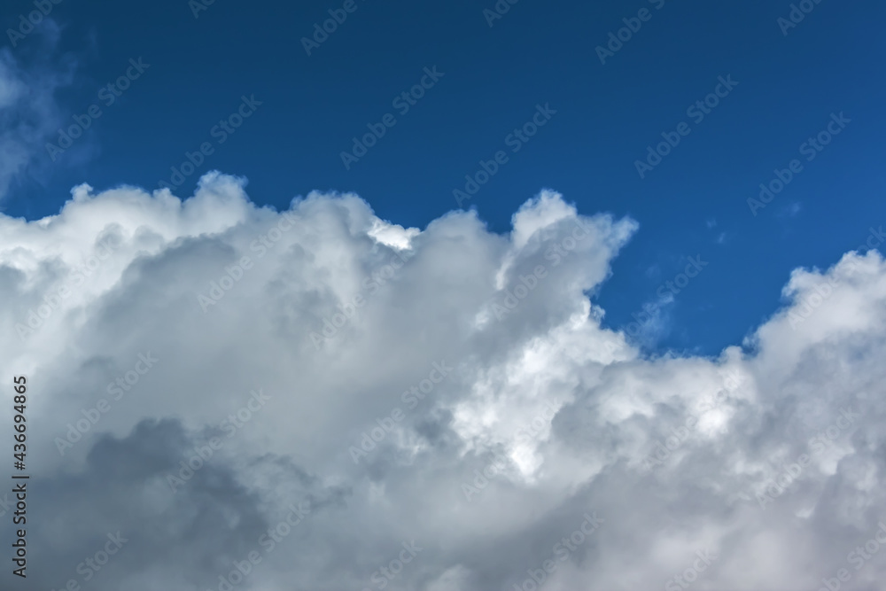 Clouds in the blue sky on a bright cloudy day Clouds in the blue sky on a bright cloudy day
