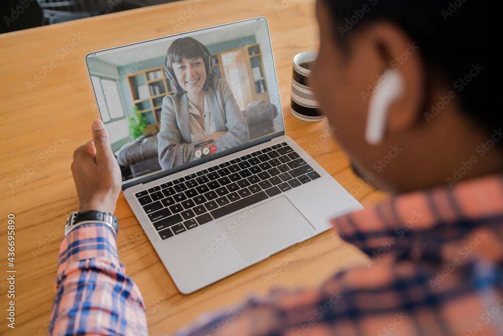 Man on a video call from work. Man on a video call from work.