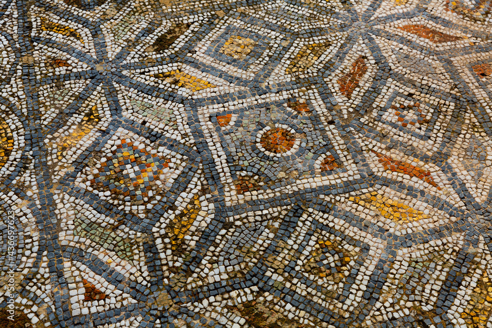 Closeup of patterns of ancient stone mosaic for floor facing in ruined houses of Ephesus, Izmir, Turkey