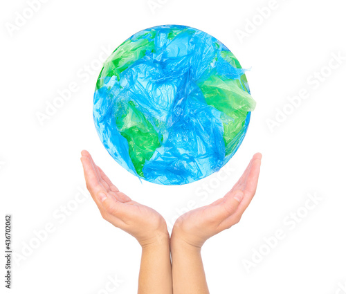 Human hands holding the Earth globe with care