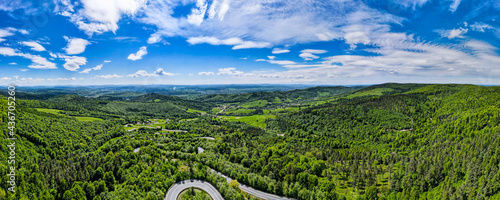 Panoramic Drone View Over Lesko and Sanok County, Forest and Curvy Serpentine Road photo