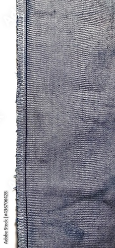 Inside blue denim fabric with hemline with white yarn gives a tailor-sewing concept.