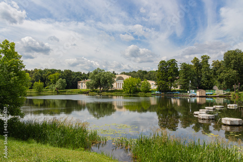 The buildings of the stable yard with a music pavilion on the shore of the Upper pond in the Kuzminki estate